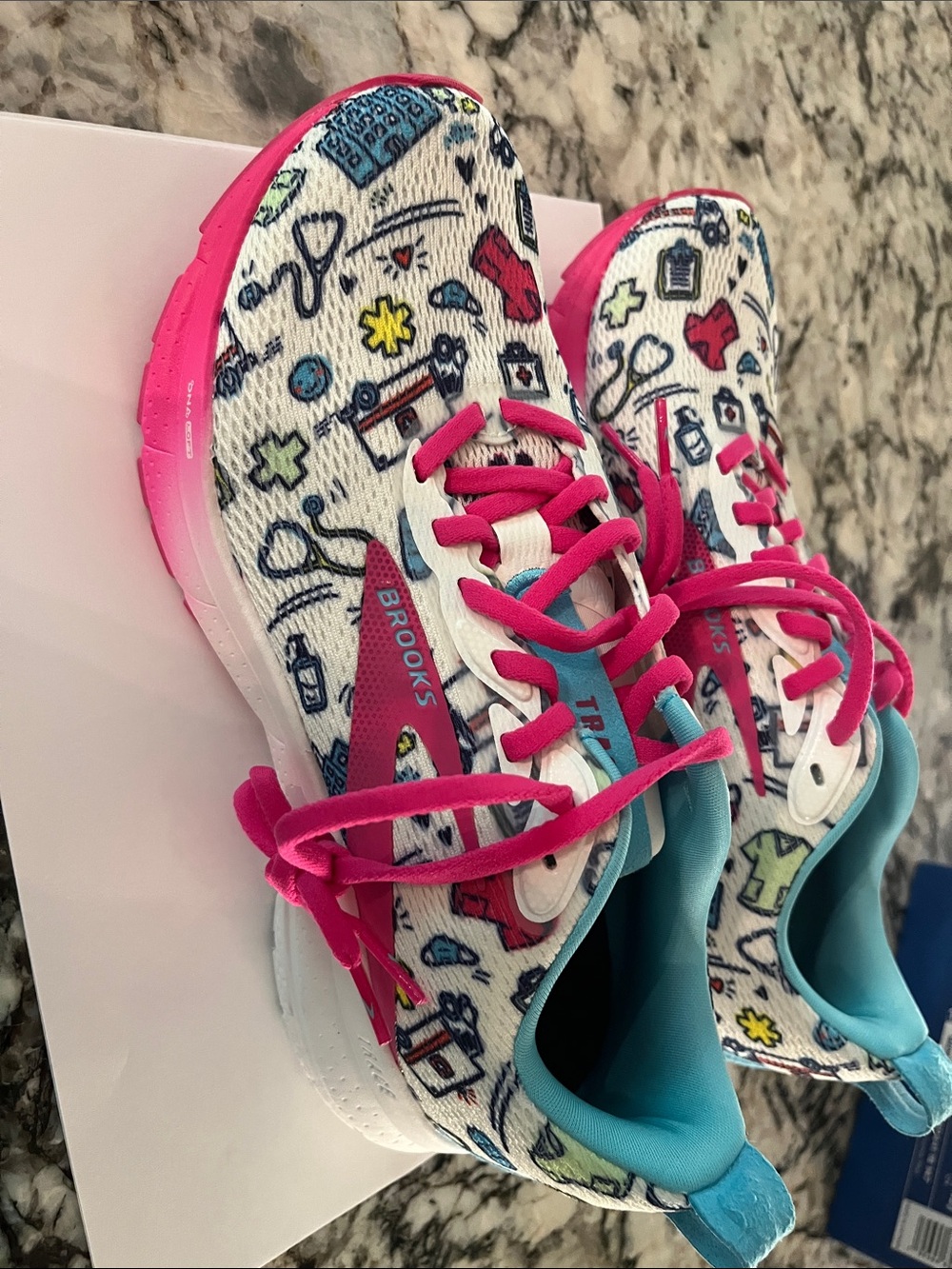 Brooks Healthcare White Sneakers with Pink Laces